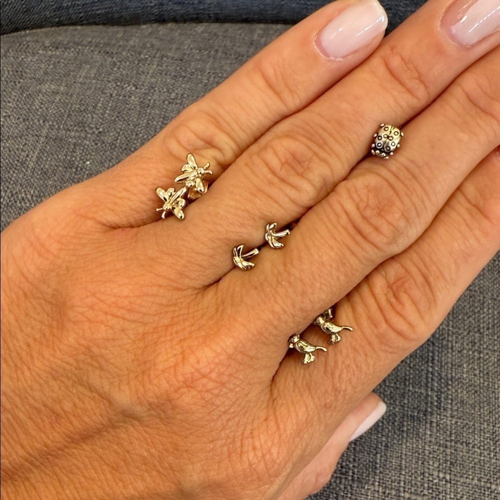 3 pairs of tiny gold earrings, bird, dragon fly and palm trees and 1 ladybug